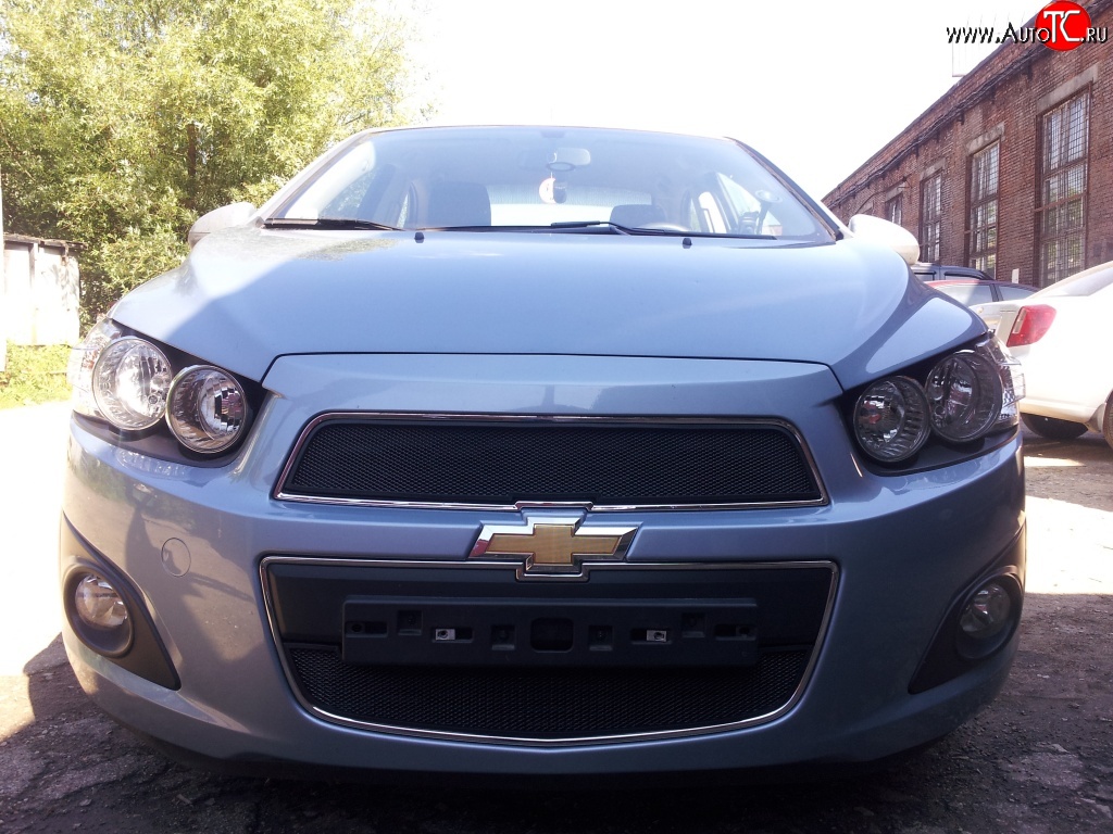 1 469 р. Нижняя сетка на бампер Russtal (черная) Chevrolet Aveo T300 седан (2011-2015)  с доставкой в г. Воронеж