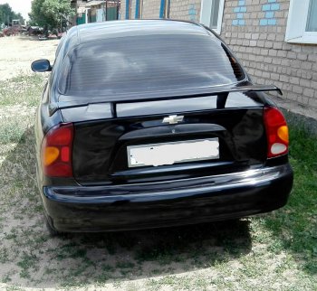 3 169 р. Низкий универсальный спойлер Кураж Chevrolet Lacetti седан (2002-2013) (Без места под стоп сигнал, Неокрашенный)  с доставкой в г. Воронеж. Увеличить фотографию 16