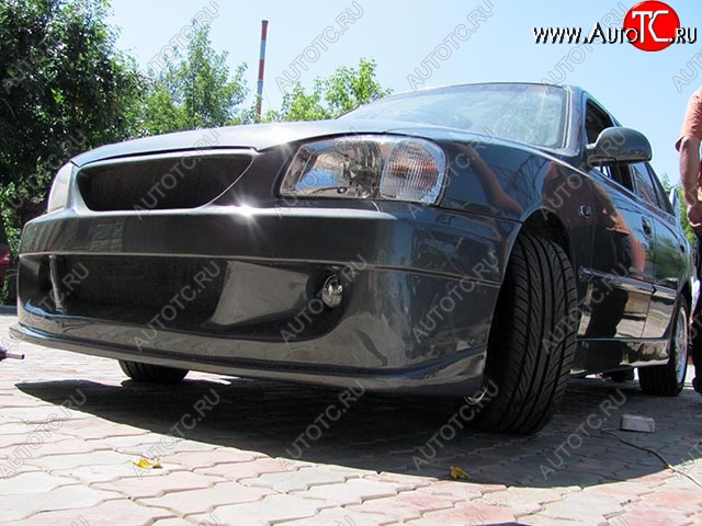 6 099 р. Передний бампер Racer Hyundai Accent 2 LC седан дорестайлинг (ТагАЗ) (1999-2012) (Неокрашенный)  с доставкой в г. Воронеж