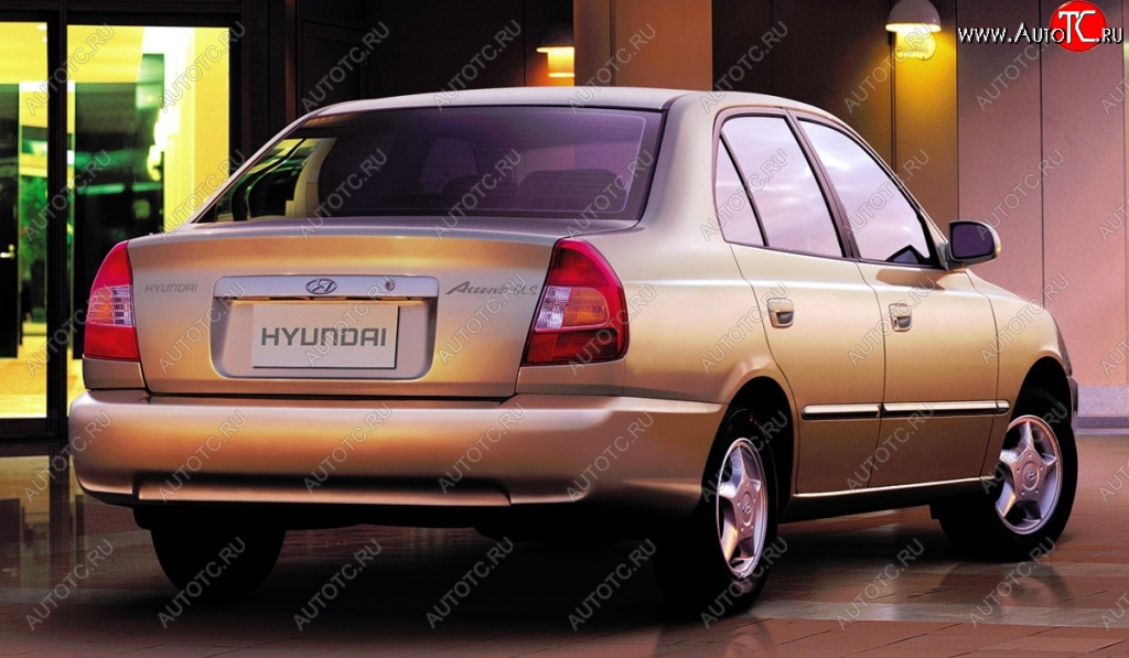 4 899 р. Задний бампер Стандартный Hyundai Accent 2 LC седан дорестайлинг (ТагАЗ) (1999-2012) (Неокрашенный)  с доставкой в г. Воронеж