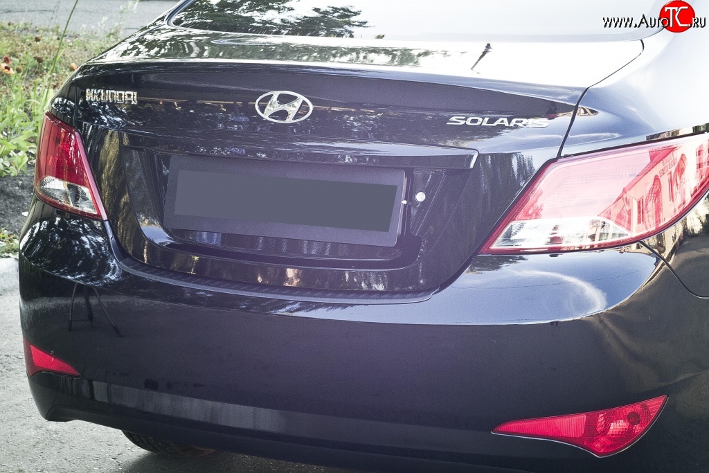 1 179 р. Накладка на верхнюю часть заднего бампера RA Hyundai Solaris RBr седан рестайлинг (2014-2017)  с доставкой в г. Воронеж