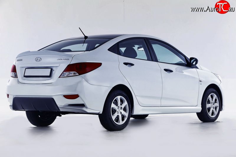 13 499 р. Задний бампер Sport Hyundai Solaris RBr седан дорестайлинг (2010-2014) (Неокрашенный)  с доставкой в г. Воронеж