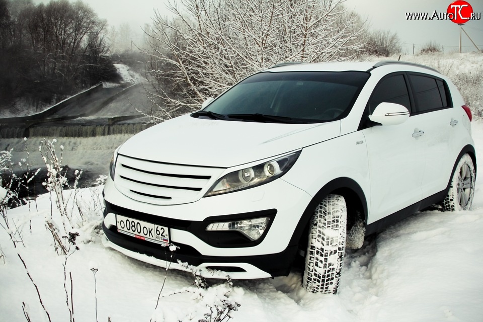 5 399 р. Накладка на передний бампер Ixion Style  KIA Sportage  3 SL (2010-2014) дорестайлинг (Неокрашенная)  с доставкой в г. Воронеж