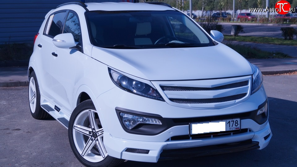 7 799 р. Накладка на передний бампер JSW Style  KIA Sportage  3 SL (2010-2014) дорестайлинг (Неокрашенная)  с доставкой в г. Воронеж