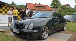 12 599 р. Передний бампер AMG  Mercedes-Benz E-Class  W210 (1996-1999) дорестайлинг седан, дорестайлинг универсал (Неокрашенный)  с доставкой в г. Воронеж. Увеличить фотографию 1