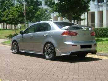 7 499 р. Накладка заднего бампера Zodiak (под одинарный выхлоп) MV-Tuning Mitsubishi Lancer 10 CY седан дорестайлинг (2007-2010) (Неокрашенная)  с доставкой в г. Воронеж. Увеличить фотографию 3