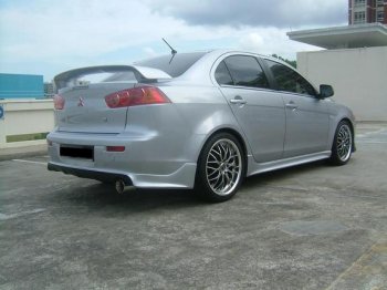 7 499 р. Накладка заднего бампера Zodiak (под одинарный выхлоп) MV-Tuning Mitsubishi Lancer 10 CY седан дорестайлинг (2007-2010) (Неокрашенная)  с доставкой в г. Воронеж. Увеличить фотографию 4