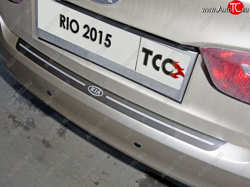 2 999 р. Накладка на задний бампер, ТСС Тюнинг  KIA Rio  3 QB (2015-2017) рестайлинг седан, хэтчбек 5 дв. рестайлинг (лист шлифованный надпись RIO)  с доставкой в г. Воронеж