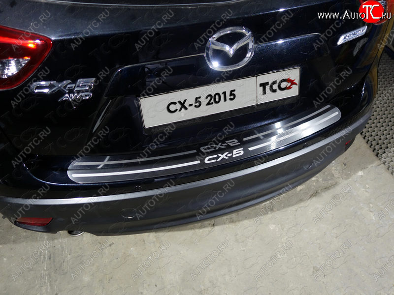 3 999 р. Накладка на задний бампер, ТСС Тюнинг  Mazda CX-5  KE (2015-2017) рестайлинг (лист шлифованный надпись CX-5)  с доставкой в г. Воронеж