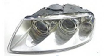 Левая фара (с электрокорректором, ксенон) BodyParts Volkswagen Touareg 1 GP дорестайлинг (2002-2007)