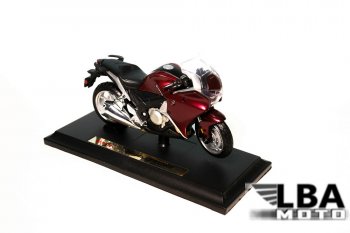 1 299 р. Модель мотоцикла Honda VFR1200F Бордового цвета масштаб 1 18  пм-00002236  с доставкой в г. Воронеж. Увеличить фотографию 1