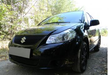 2 899 р. Защита радиатора Стрелка11 Стандарт Suzuki SX4 GYC21S дорестайлинг седан (2006-2012) (черная)  с доставкой в г. Воронеж. Увеличить фотографию 2