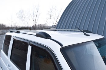 8 489 р. Рейлинги Petroil Tuning  Уаз Патриот ( 3163 5-дв.,  3163 5 дв.) (2014-2025) 1-ый рестайлинг, 2-ой рестайлинг (Цвет: серебристый муар)  с доставкой в г. Воронеж. Увеличить фотографию 3
